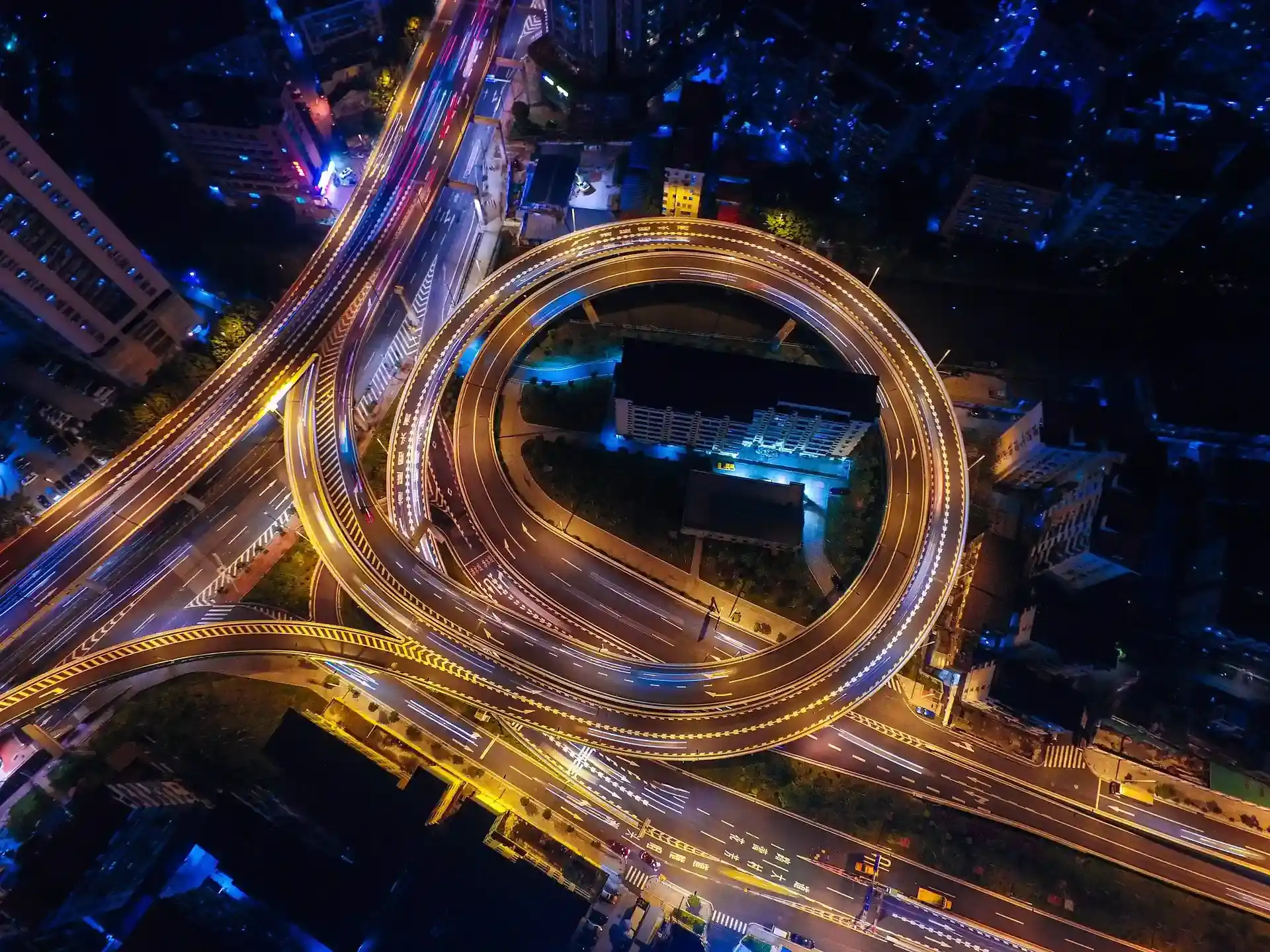 Interchange with surrounding houses at night